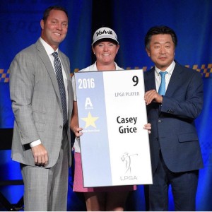 Grice accepting her LPGA tour card after finishing ninth on the Symetra tour money list. 